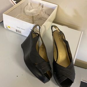 Navy blue wedge sandal comfortable. Only worn a few times